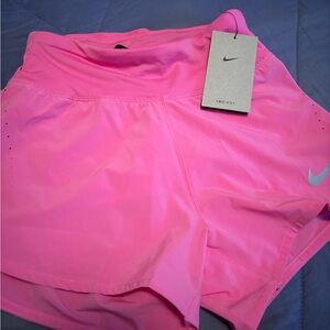 Nike Women's Vibrant pink Athletic Shorts